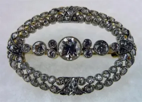 Antique Oval Shaped Diamond Brooch in Platinum and 18K Yellow Gold