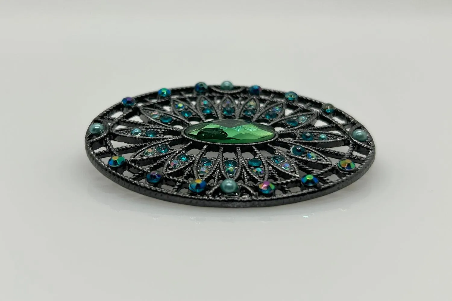 Green and Blue Rhinestone Edwardian Style Brooch in Blackened Frame