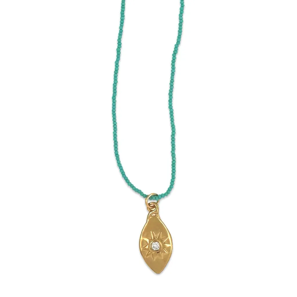 NOLA NECKLACE IN GOLD ON TURQUOISE BEADS