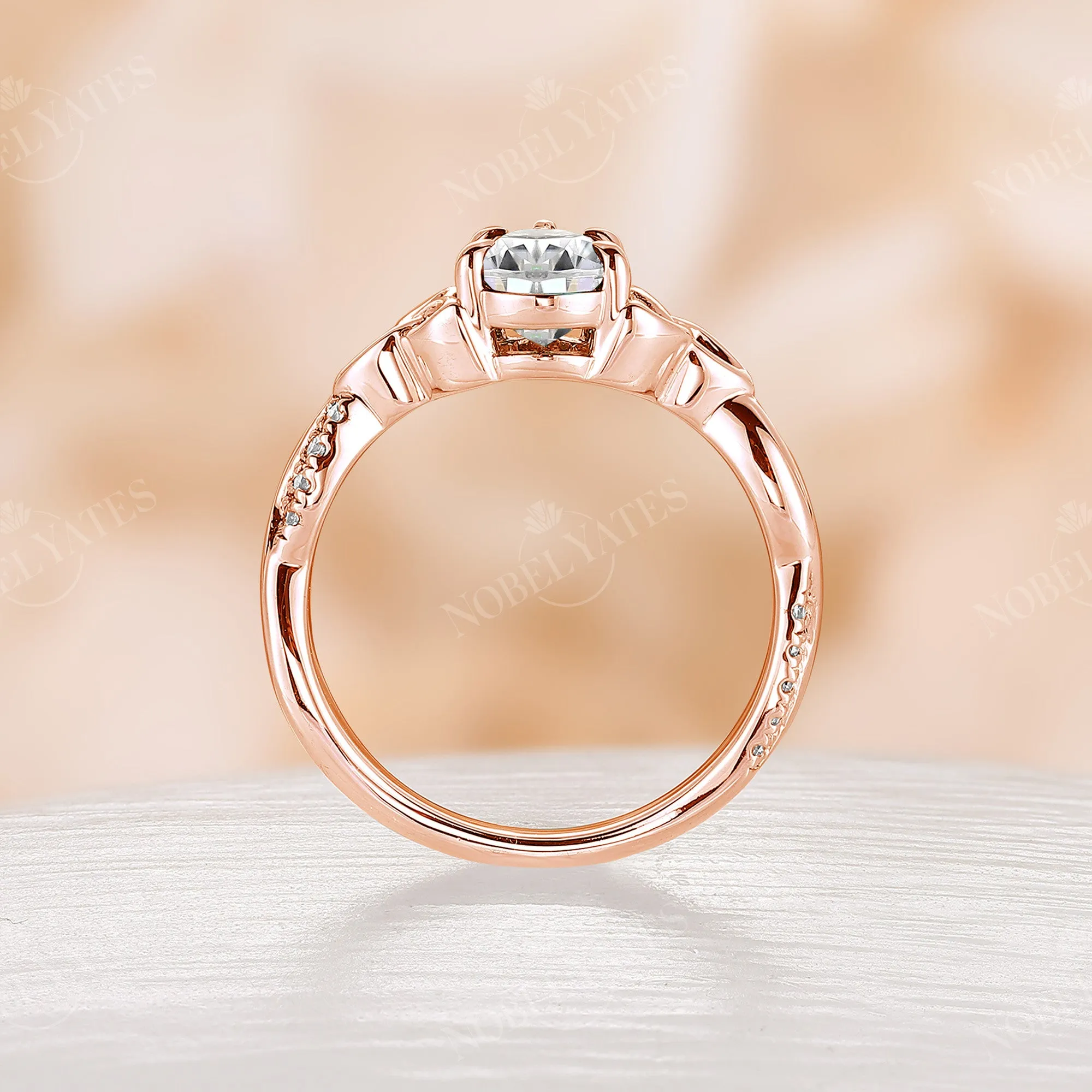 Pear Cut Moissanite Rose Gold Celtic Twist Engagement Ring