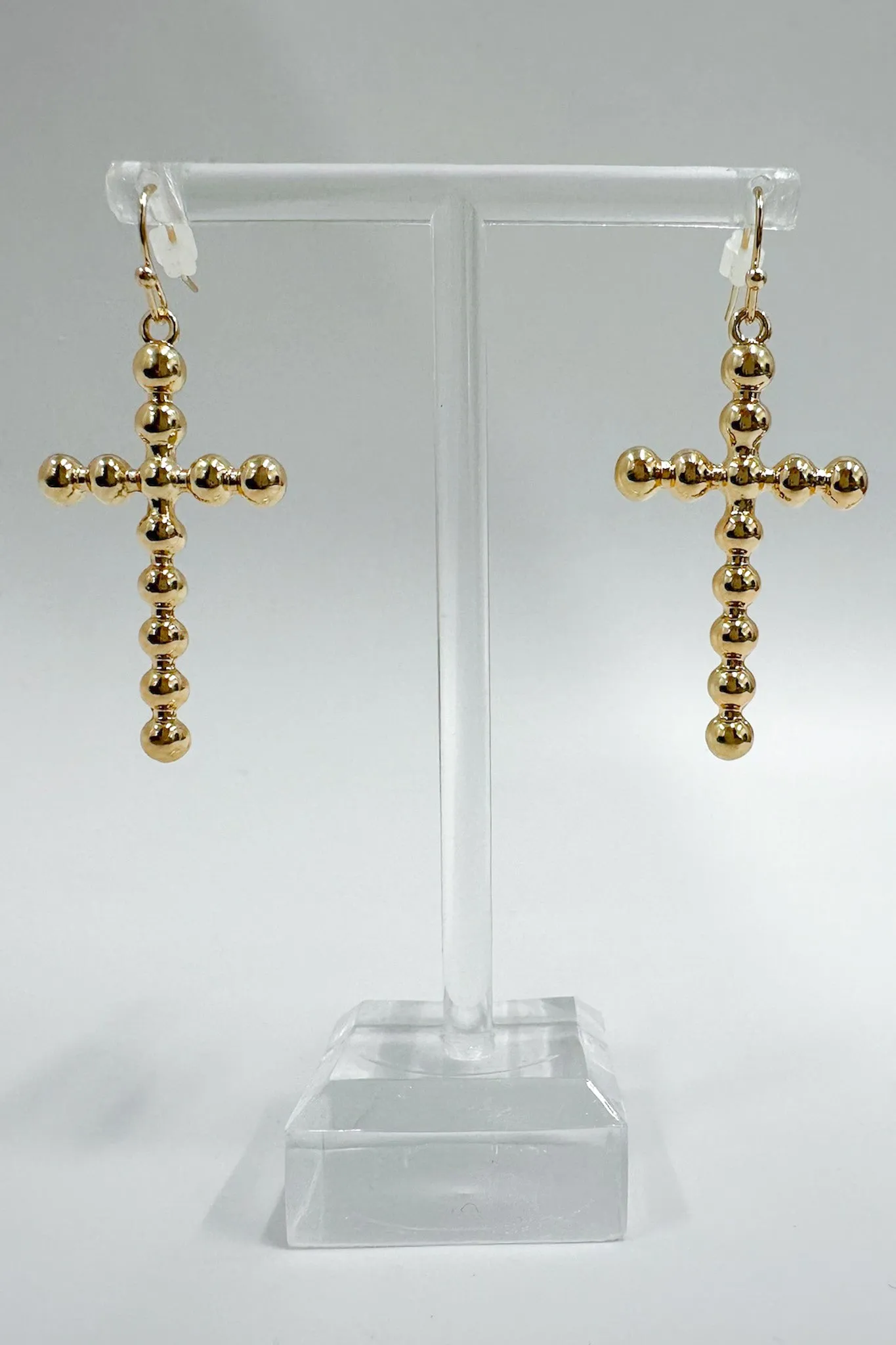 Undeniable Radiance Bubble Cross Dangle Earrings