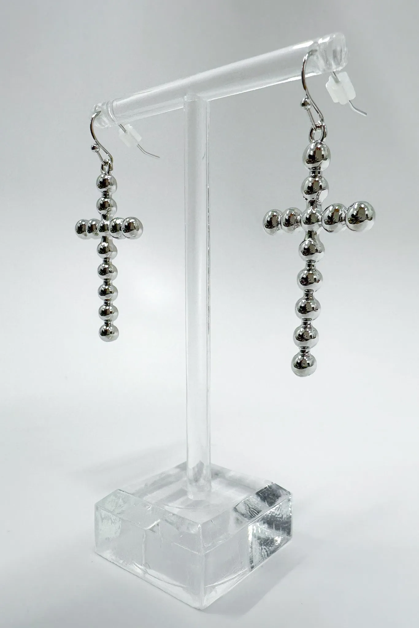 Undeniable Radiance Bubble Cross Dangle Earrings