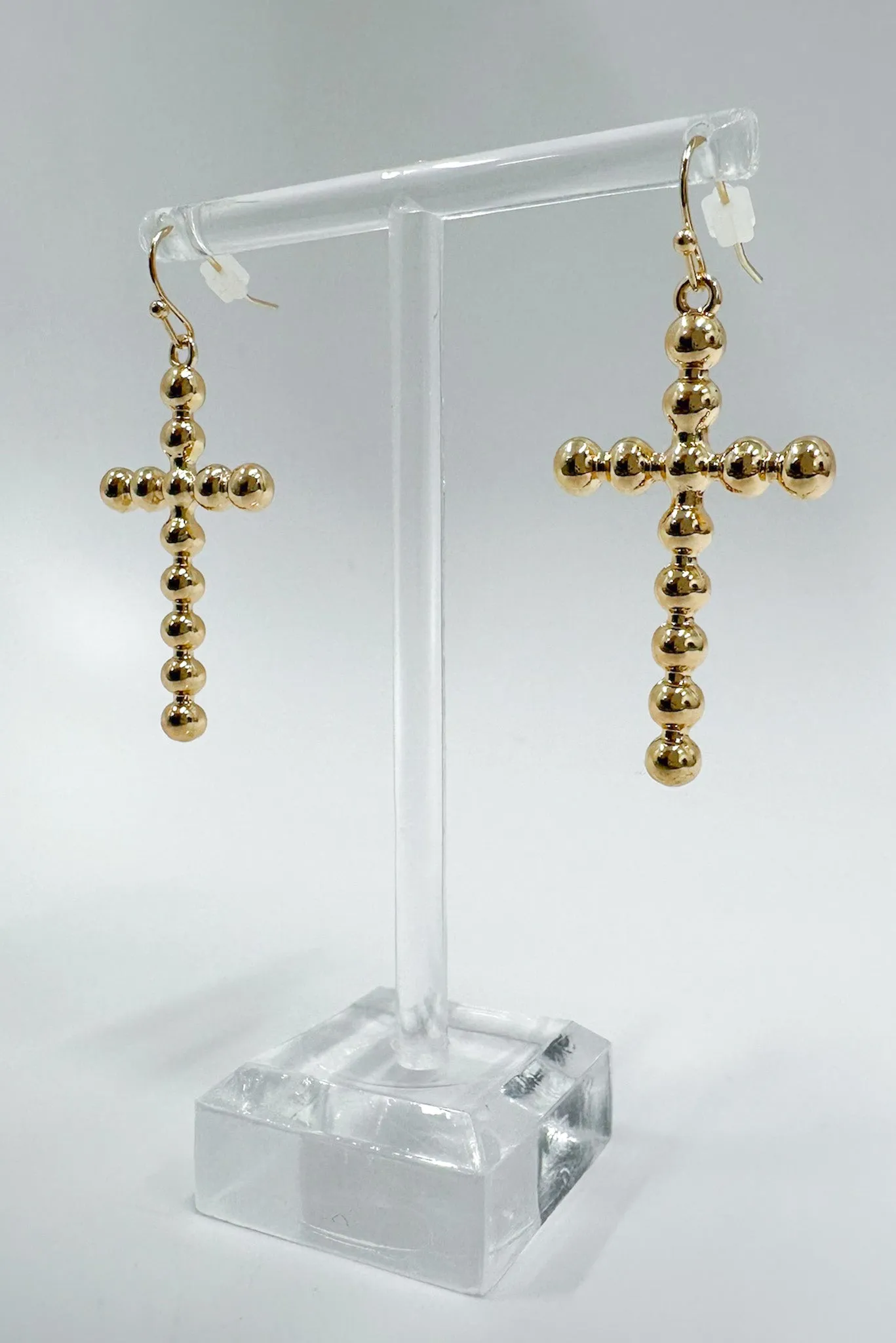 Undeniable Radiance Bubble Cross Dangle Earrings