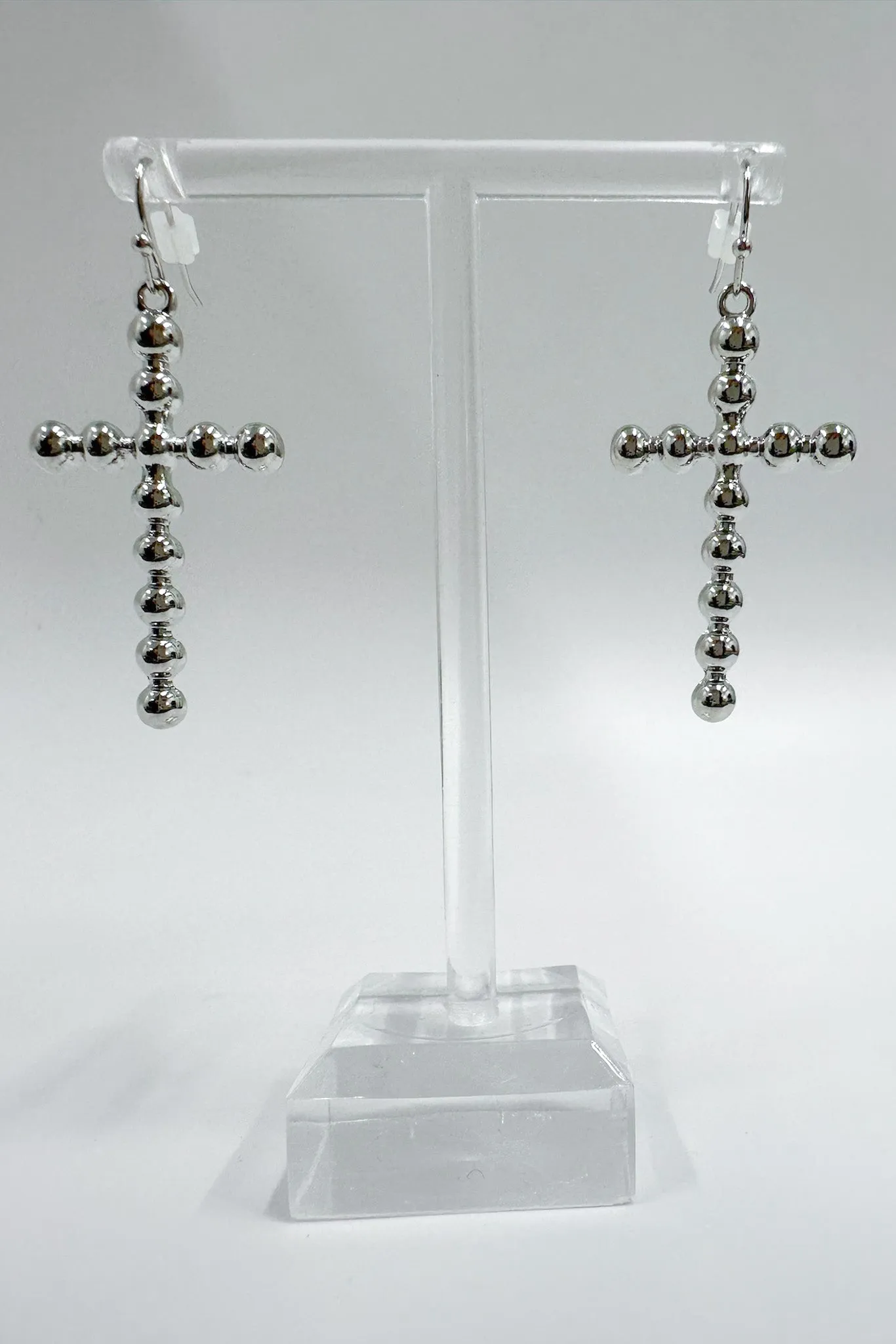 Undeniable Radiance Bubble Cross Dangle Earrings